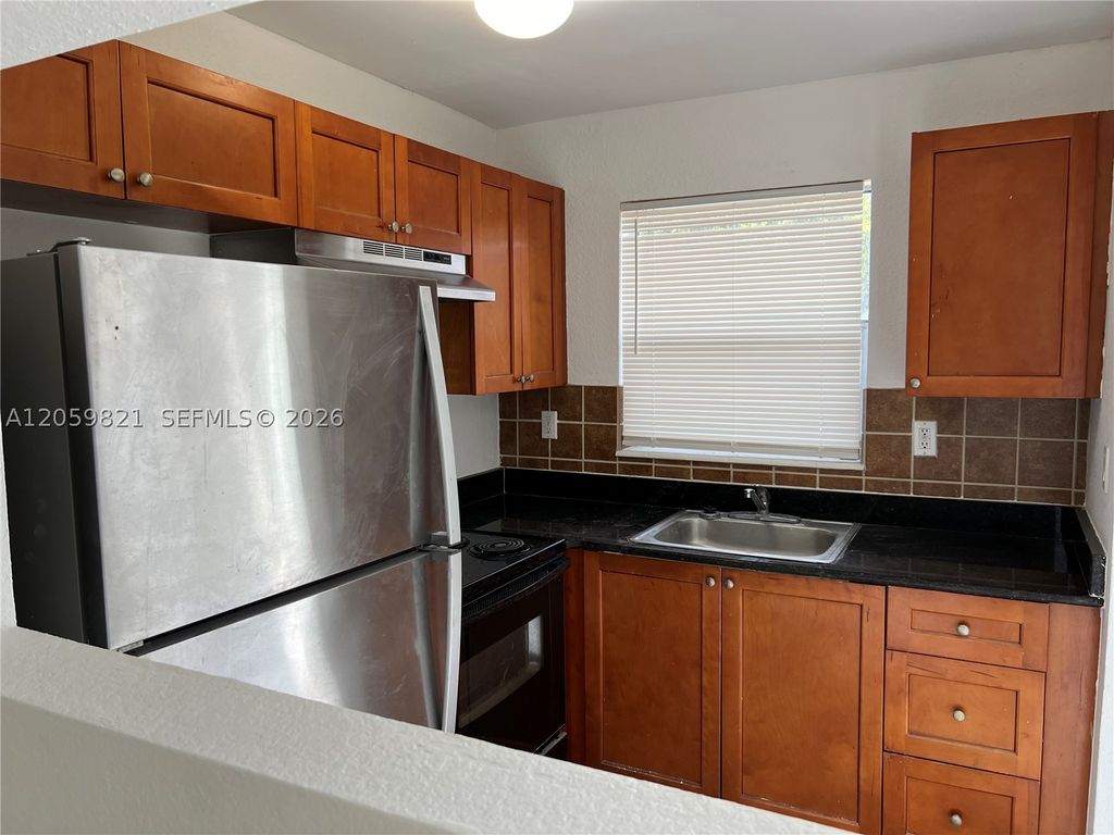 Photo of 4251 NW 5th St #123, Plantation, FL 33317 (MLS # A12059821)