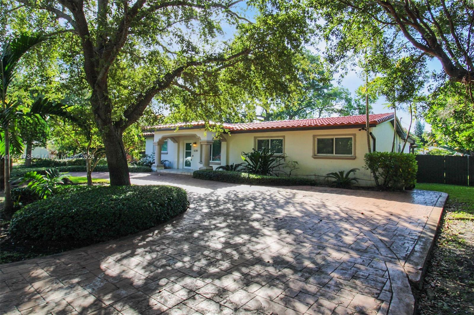 New Year, New Price! Gorgeous oasis of elegance and comfort. Bathed in natural light, this split-plan residence offers 2,226 sq ft of beautifully designed living space on a sprawling 13,000 sq ft double lot. With 3 bedrooms, 2 baths, a brand-new kitchen, and a sparkling new pool, it’s designed for both relaxation and entertaining. Enjoy evenings on the covered porch or host gatherings in the fully equipped outdoor kitchen, perfect for weekend barbecues. With a new roof installed in 2024, an efficient irrigation system, and luxurious 36x36 tile throughout, this abode is the epitome of style and peace of mind. Closely located near the University of Miami, Coral Gables, Miami International Airport and more, this is the ultimate dream home combining elegance, comfort, and prime location!