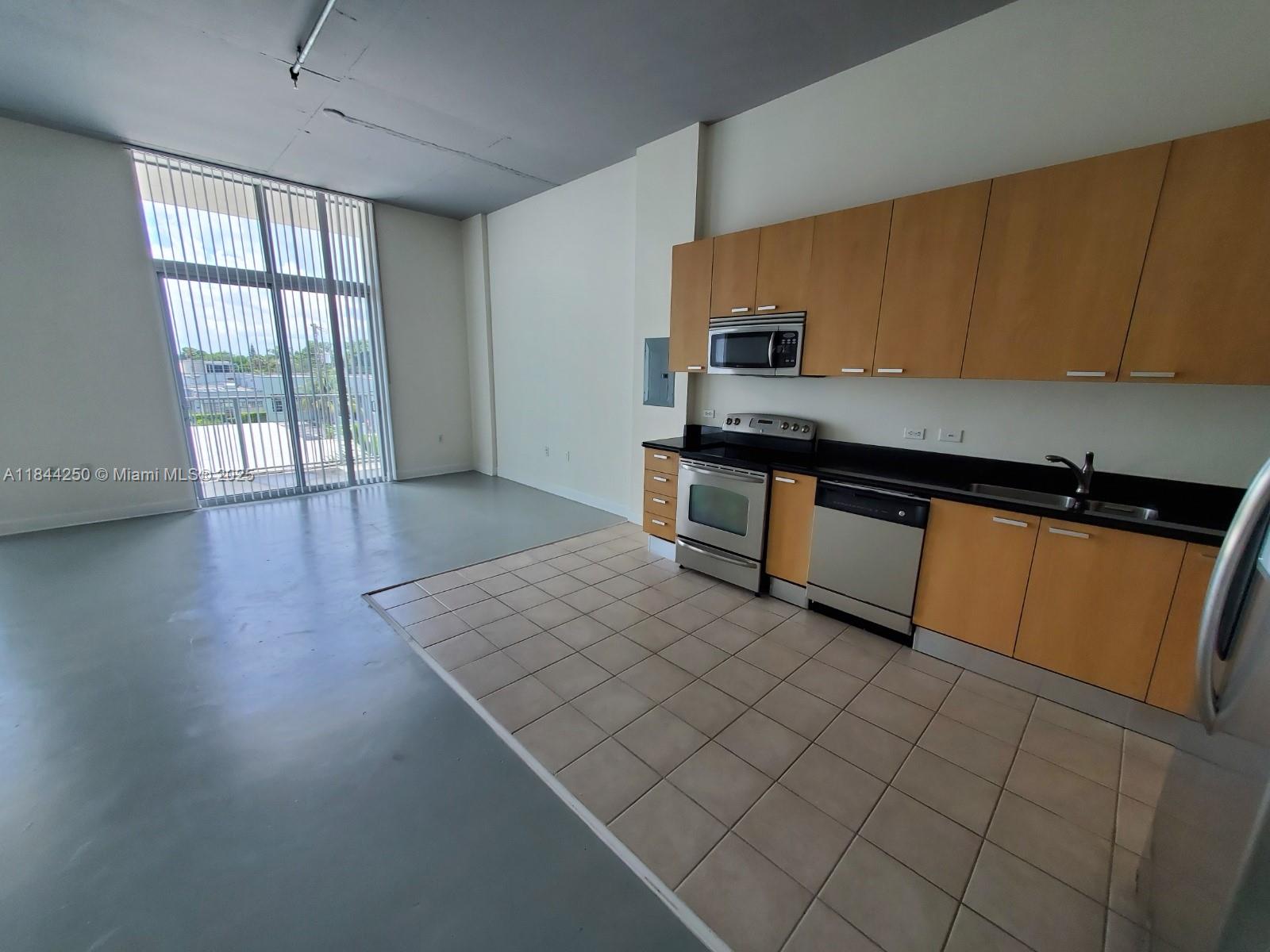 Loft style 1 bdr 1 bath with big balcony and blue stained concrete floors throughout the unit. A definite must see if
your interest is to live right by Hollywood's stip where all the restaurants and bars are. Easy to show. Click on
Show assist. Available immediately.