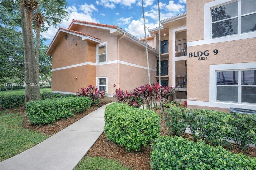 Photo of 8851 Wiles Rd #106, Coral Springs, FL 33067 (MLS # A11979882)