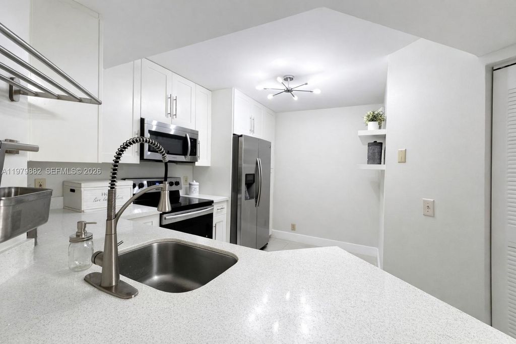 Photo of 8851 Wiles Rd #106, Coral Springs, FL 33067 (MLS # A11979882)