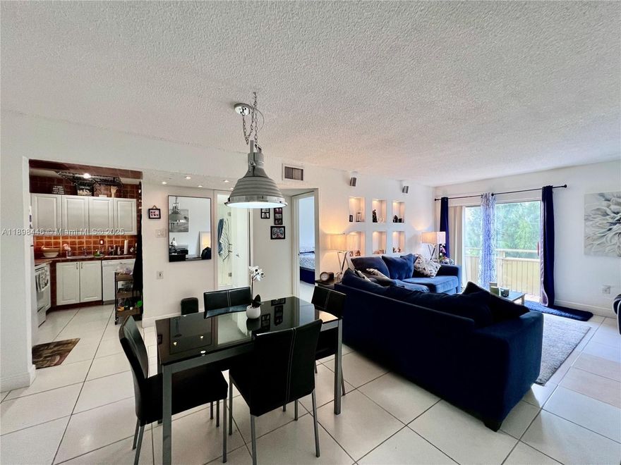 Welcome home to this beautifully maintained 1-bedroom, 1-bathroom condo located on the 4th floor with stunning sky and water views from your private balcony. Enjoy natural light throughout, an open-concept living area, and a spacious bedroom with ample closet space. The unit offers a peaceful retreat while being centrally located in the heart of NW Miami-Dade, just minutes from shopping, dining, and major highways for easy access to Miami and beyond. The community features secure entry and elevator access to go up to the unit. Investor friendly.