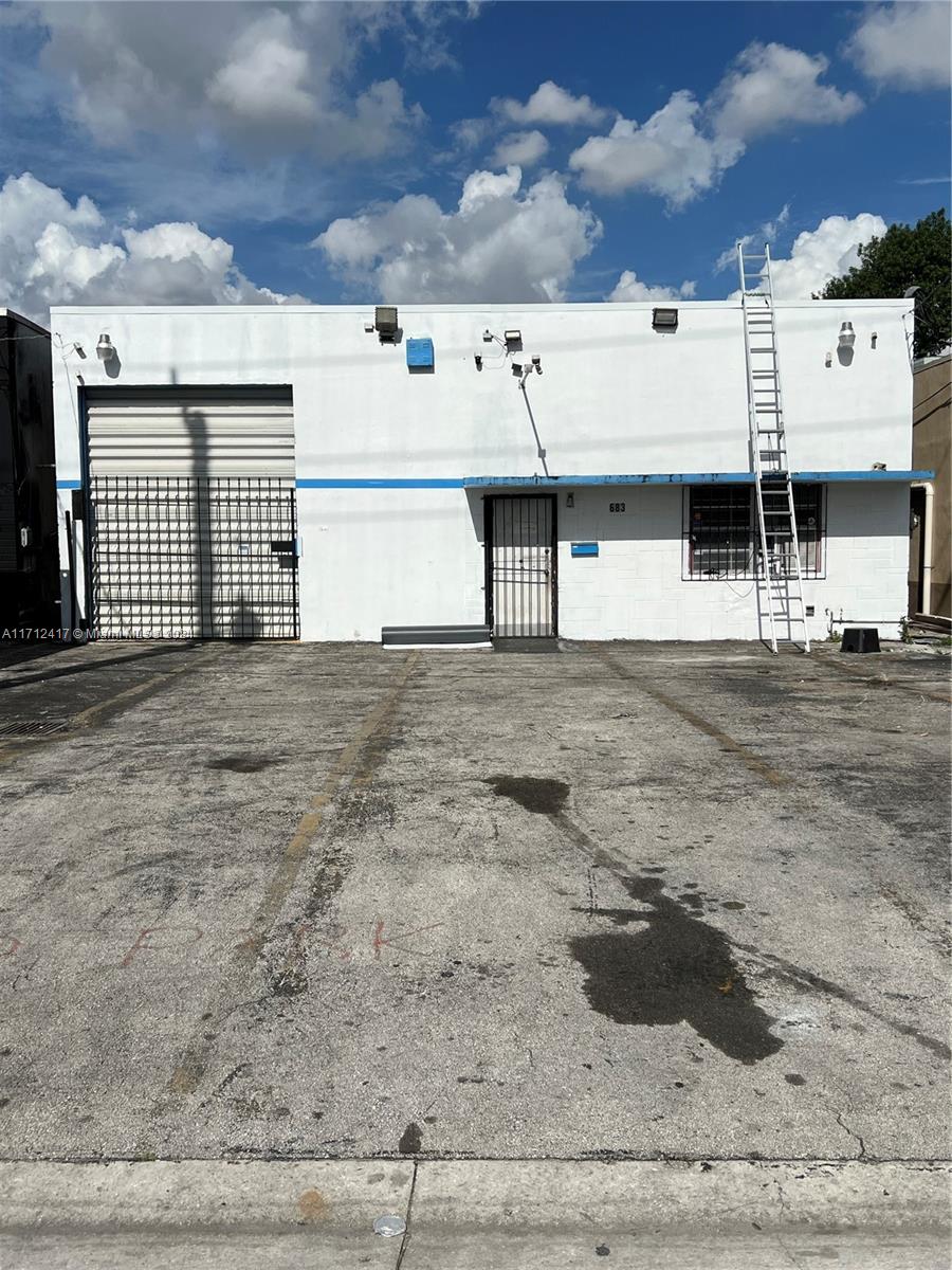 BRAND NEW TPO ROOF GREAT INVESTMENT IN HIALEAH. This FREESTANDING 4000 sf warehouse is for industrial use sitting on 5740 Sf lot. 16ft ceiling, high garage doors, 3 restrooms with several offices inside. Great investment for Owner Occupied Buyer or for the potentials investors . Property currently VACANT Building located close to Miami International Airport, PortMiami, and major highways like I-75, I-95, and the Florida Turnpike, the city offered excellent connectivity for businesses engaged in import/export and distribution activities. PLEASE DRIVE BY THE PROPERTY