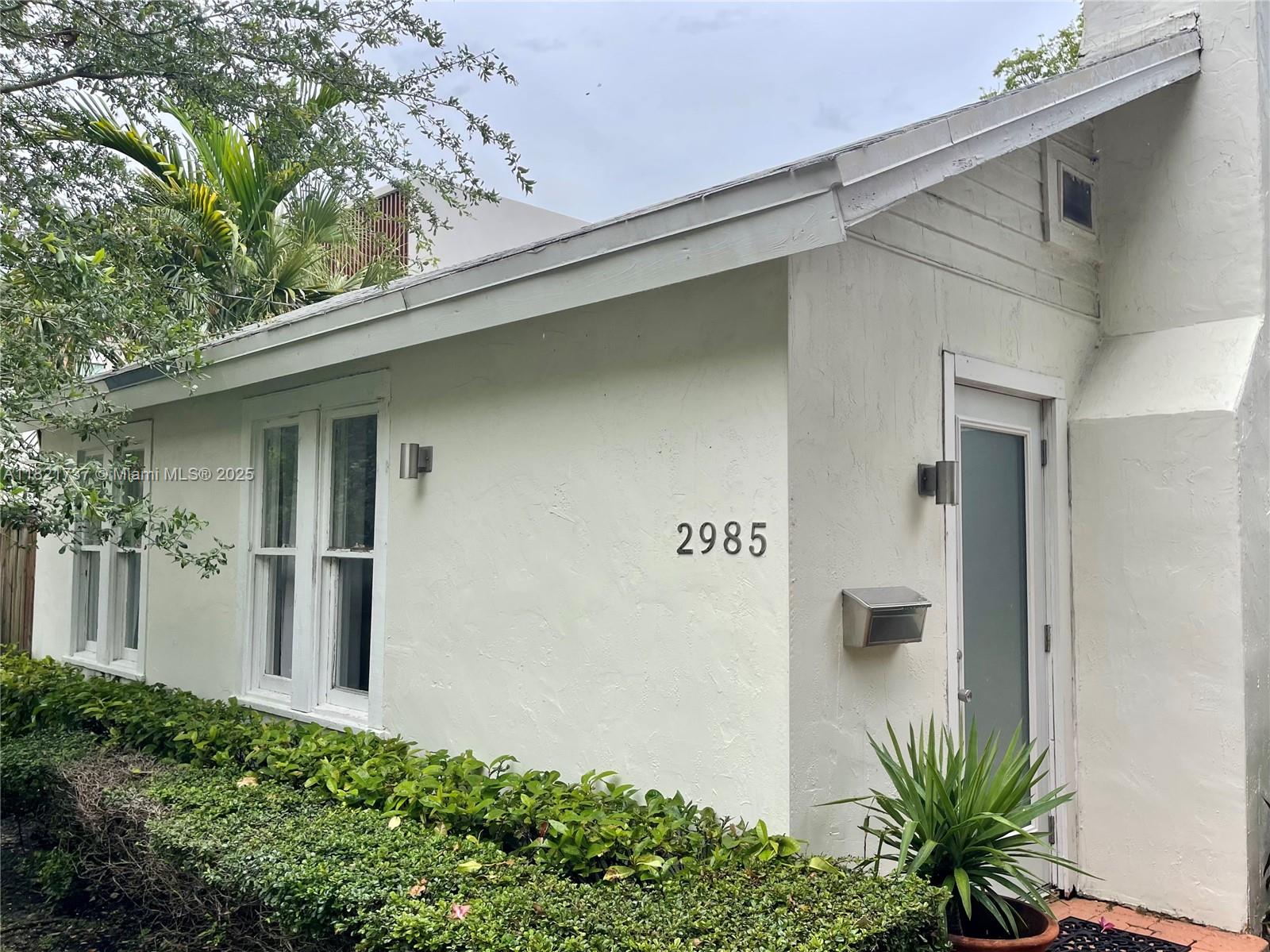Cozy 2/1 cottage, perfect location! Charming+ a perfect pied- a- terre in the Grove, tucked in between muiti- million dollars mansions. . Has 2 beds, second room currently being used as an office. . Vintage Coconut Grove home that features , wood floors and a fireplace. Enjoy and just kick back in your easy low maintenance yard - Stroll down to the waterfront and parks, Close to everything grove , restaurants, entertainment. Live the grove lifestyle, Its ready to make your own, live as- is or add on or re- build -Cool urban vibe, location -location. Being sold as land value.