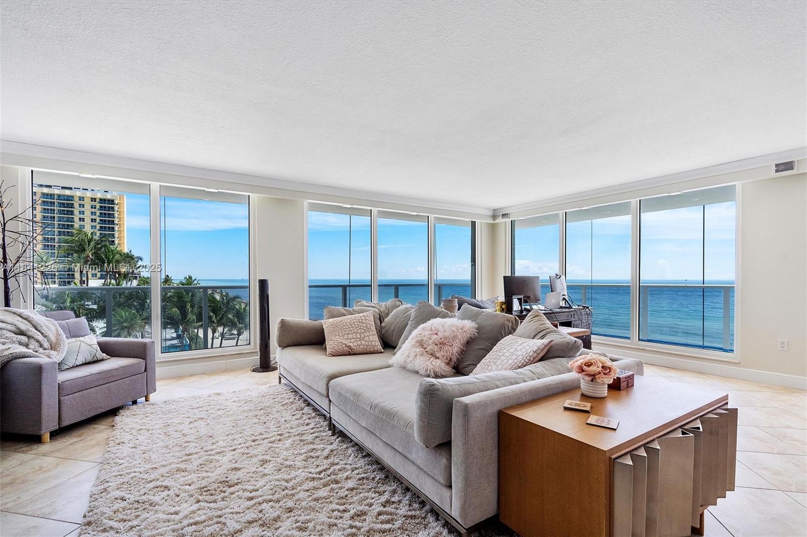 Experience luxury coastal living in this stunning 2-bedroom, 2-bathroom oceanfront unit. Offering breathtaking, unobstructed ocean views, this home provides a serene and tranquil escape. The spacious living area is flooded with natural light and seamlessly extends to your private wrap-around balcony, where you can enjoy sunrises over the water. Located in a resort-style building, you'll have access to luxurious amenities with 2 pristine pools, fitness center, private beach access, and 24/7 security. This prime location offers easy access to nearby shopping, dining, and entertainment.