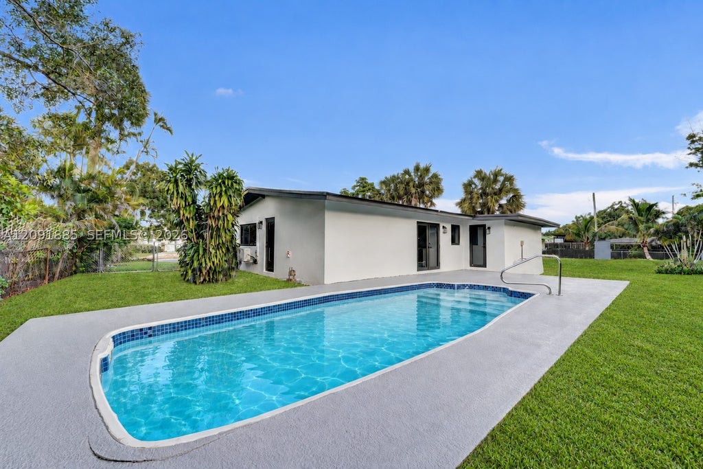Photo of 1239 SW 29th Ter, Fort Lauderdale, FL 33312 (MLS # A12091885)