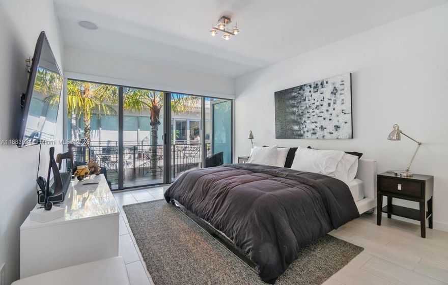 Amazing 1BD/1.5BA townhouse at Artecity. This is a Designer's ready 2 story residence with great light and huge windows leading out to lushly landscaped courtyard. Fully outfitted with customized Audio/Visual throughout the unit, designer lighting, motorized window treatments, 2 smart Samsung tv’s, European-style kitchen, and stainless steel appliances. Amenities include two pools, gym, valet parking, 24hrs security & complimentary beach service. Blocks from the best restaurants, and hotels in South Beach.