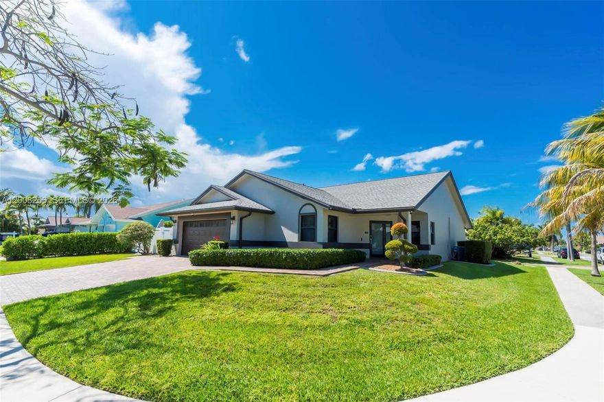 Welcome to this beautifully remodeled 3-bedroom, 2-bath, 2 car garage residence ideally situated on a spacious corner lot in the heart of Dania Beach. Step inside to discover a thoughtfully updated interior featuring recessed lighting and a modern open feel. The chef’s kitchen is a standout, complete with stainless steel appliances, double oven, dishwasher, industrial-style sink, pot filler, and a dedicated coffee bar—designed for both everyday living and entertaining. The spacious primary suite offers a true retreat with a spa-inspired bathroom, custom built-ins, and generous walk-in closet. Additional upgrades include high-impact windows, doors, and garage door for peace of mind. Major systems have been well maintained, including a newer A/C unit, water heater around 4 years old, and a roof approximately 10 years old.
Step outside to your private oasis featuring a fully remodeled saltwater pool and jacuzzi, along with an expansive outdoor entertaining area perfect for hosting or relaxing in style. This home is just minutes from the renowned Dania Pointe, pristine beaches, vibrant restaurants, and provides easy access to major roadways for ultimate convenience. This home truly has everything you need and more—an exceptional opportunity you must see and experience for yourself.