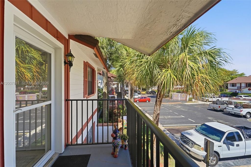 Photo of 2496 NW 89th Dr #2496, Coral Springs, FL 33065 (MLS # A12007817)