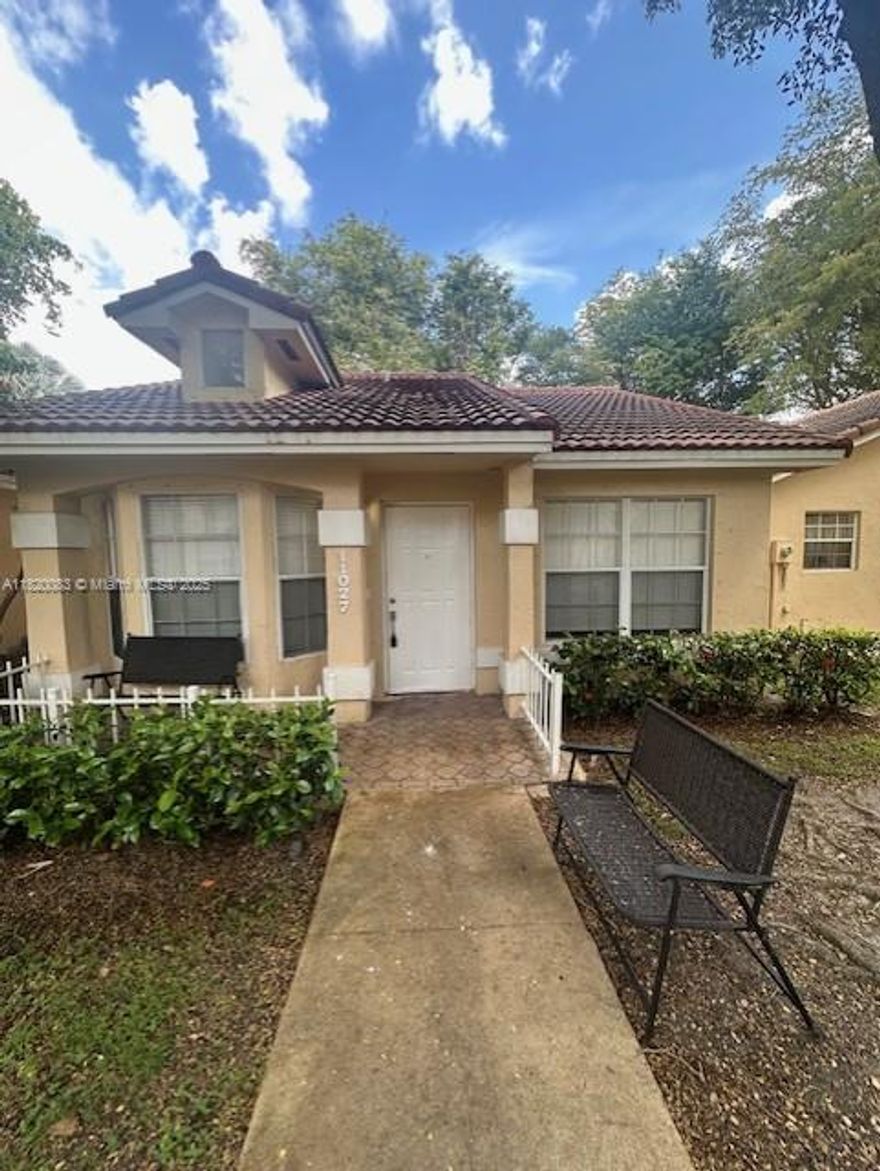 Welcome to this well-kept 2-bedroom, 2-bathroom townhouse villa just minutes from Tamiami Airport. This bright and spacious corner unit features a functional kitchen with modern appliances and a private fenced patio ideal for relaxing or entertaining. Gated Community 

Enjoy comfortable living with in-unit laundry, assigned parking, and low HOA fees. Conveniently located near shopping, dining, top-rated schools, and major roadways.