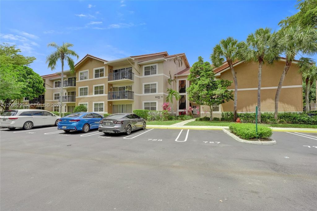 Photo of 8721 Wiles Rd #101, Coral Springs, FL 33067 (MLS # A12008299)