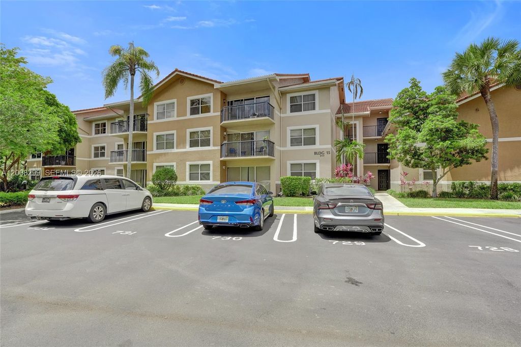 Photo of 8721 Wiles Rd #101, Coral Springs, FL 33067 (MLS # A12008299)