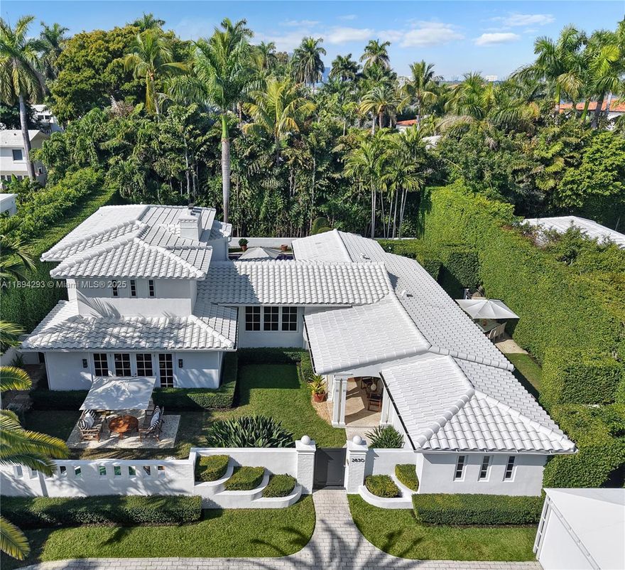 Discover island luxury with this stunning Mid-century modern masterpiece by renowned architect Carlos Schoeppl, renovated to perfection for modern living. Set on a spacious lot in exclusive, guard-gated Sunset Island I with 24/7 security, this estate offers unmatched sophistication and value—being the only home of its size under $10M. Comparable properties and new developments nearby often exceed $15 million, making this a rare and exceptional opportunity. Enjoy exquisite finishes, a gourmet gas kitchen, butler’s pantry, whole-house generator, smart home tech, heated pool, summer kitchen, and 9 Sonos zones for true resort-style living in Miami Beach’s most coveted enclave, at an exceptional price point.