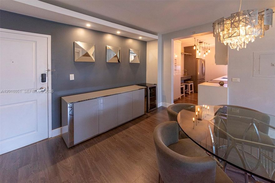 Live in unique elegance in this designer unit by E. Dormoy. Enjoy a redesigned kitchen with stainless steel appliances and custom moldings. Features include walk-in closets, extra storage, and impact windows. Located in North Beach's quiet 401 BLU, you're just three blocks from the beach and boardwalk with panoramic views of the Miami skyline, bay, and ocean. The pet-friendly building offers luxury amenities: a 24/7 front desk, gym, rooftop pool, and two secured parking spaces. Recent updates to chillers and air filtration ensure exceptional value and luxury living in Miami.