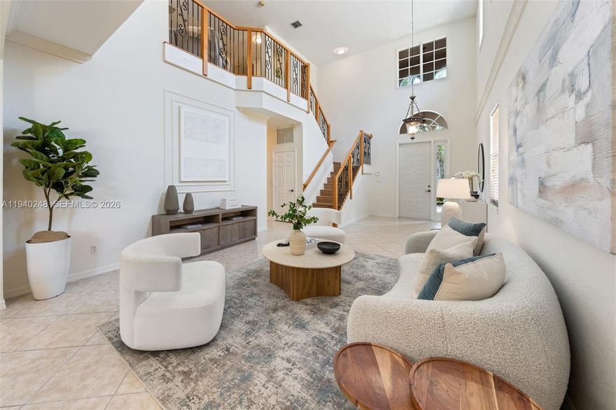 Beautifully Renovated 5-Bedroom Home + Loft in Isles at Weston. This modern two-story residence is move-in ready, with new flooring, a renovated kitchen, and stylish details throughout. The luxurious primary bathroom is completely updated, while the upstairs loft is ideal for an office, lounge, or playroom. Private backyard with stunning Lake. The bright open layout fills the home with natural light. Located in a gated community with 24-hour surveillance, Isles at Weston offers resort-style amenities including a pool, fitness center, sports courts, and play areas. Close distance to the clubhouse. 
A rare find you won’t want to miss!