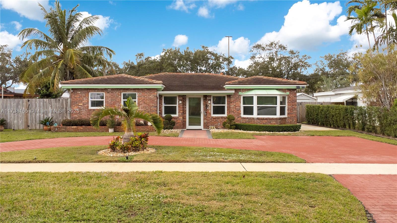 Stunning Single family home in Hollywood PRIME location! Quiet and beautiful neighborhood conveniently located steps to all shops: Target, Publix, Starbucks, etc and just few minutes drive to the beach! This large home has an open floor plan with a large living room, formal dining area, open kitchen, 3 great size bedrooms + play room that can be used as a 4th bedroom. Lots of light and nice pool views from the dining room. Great size backyard with a perfect size pool, lots of green areas and tiki bar, perfect for family time and entertaining. Additional shed in backyard, laundry room off the kitchen with lots of storage space. Newer roof and air conditioning system.
Ready to move in! 3D tour available. House is rented for $4300 per month.