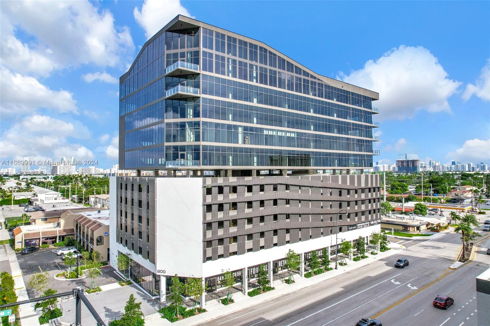 Atlantic Village Professional Center at 800 N Federal Highway offers 110,000 square feet of modern commercial space in the highly sought-after mixed-use development of Atlantic Village in the vibrant Hallandale Beach, FL. Welcomed by a unique and modern façade, this 12-story Class A property offers a variety of retail, office, and medical condos. The building is ideally positioned within the development, providing easy and unparalleled access to various dining, shopping, and entertainment options. Gridline Properties is proud to present Phase IV of Atlantic Village. These exclusive ninth-floor office condos feature floor-to-ceiling windows with unobstructed views, covered parking, private terraces, and building signage opportunities.