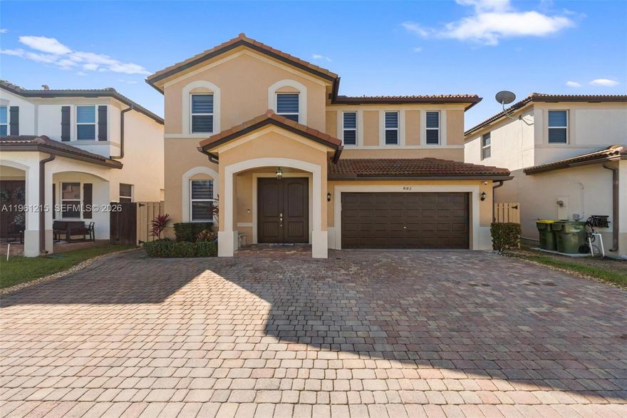 Welcome to a home designed for large families who value space, comfort, and togetherness. Built in 2018, this beautiful residence stands out for its generous layout, functional flow, and warm, inviting atmosphere—perfect for creating lasting family memories. Featuring 6 bedrooms and 4 bathrooms, the home offers plenty of room for everyone to enjoy their own space while staying connected through bright, open living areas.

The property offers ample parking for up to 8 vehicles, along with additional visitor parking within the community, making it ideal for large households and gatherings. The extended paver driveway and fully paved backyard provide the perfect setting for family celebrations and outdoor enjoyment.

Inside, the home blends style and practicality with nearly new stainless steel appliances, LED lighting throughout, ceramic tile flooring on the first level, and water-resistant laminate flooring on the second floor. Comfort is enhanced with crown molding, modern finishes, zebra blinds, and motorized blackout shades in the bedrooms and on the patio sliding door.
Additional features include a security camera system with Ring, hurricane shutters, and a two-car garage with upgraded flooring. Located in a private, well-maintained community with low HOA, just minutes from US-1, the Turnpike, Baptist Hospital, and major shopping—all within three minutes.
A beautiful, spacious, and cozy home—ideal for a growing family seeking comfort, convenience, and quality living.