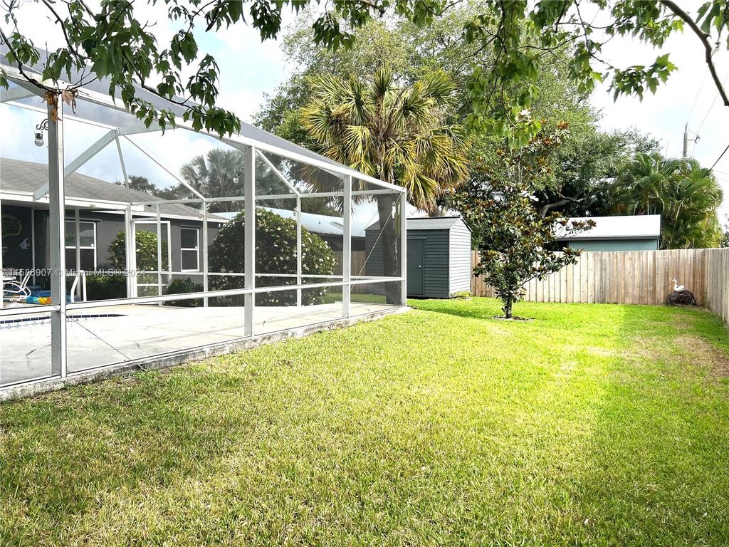 Photo of 131 NW Friar St, Port Saint Lucie, FL 34983 (MLS # A11586907)