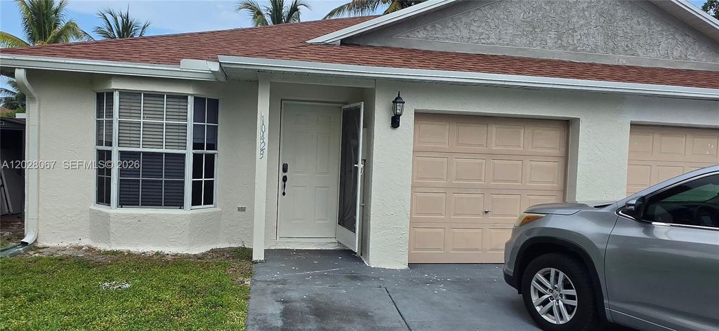 Photo of 10423 Boynton Place Cir, Boynton Beach, FL 33437 (MLS # A12028067)