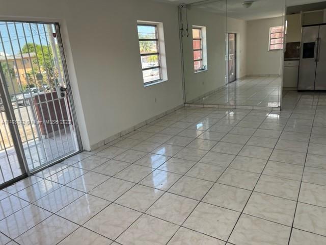 GREAT LOCATION! 3 BEDROOMS 2 BATHS, TILE FLOORS THROUGH OUT, BRIGHT, LOTS OF NATURAL LIGHT, WASHER AND DRYER IN UNIT. L SHAPED OPEN BALCONY. UNIT IS ON THE SECOND FLOOR OF A 4 UNIT BUILDING.TWO SHORT BLOCKS TO SW 8 ST, SHOPPING, RESTAURANTS, PUBLIC TRANSPORTATION. FRSHLY PAINTED. ONE ASSIGNED PARKING. STREET PARKING AVAILABLE FOR ADDITIONAL CARS. EASY TO SHOW.