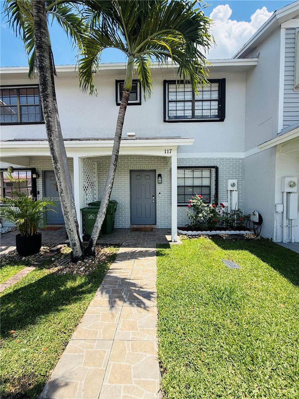 Photo of 117 NW 106th Ave #117, Pembroke Pines, FL 33026 (MLS # A12008527)