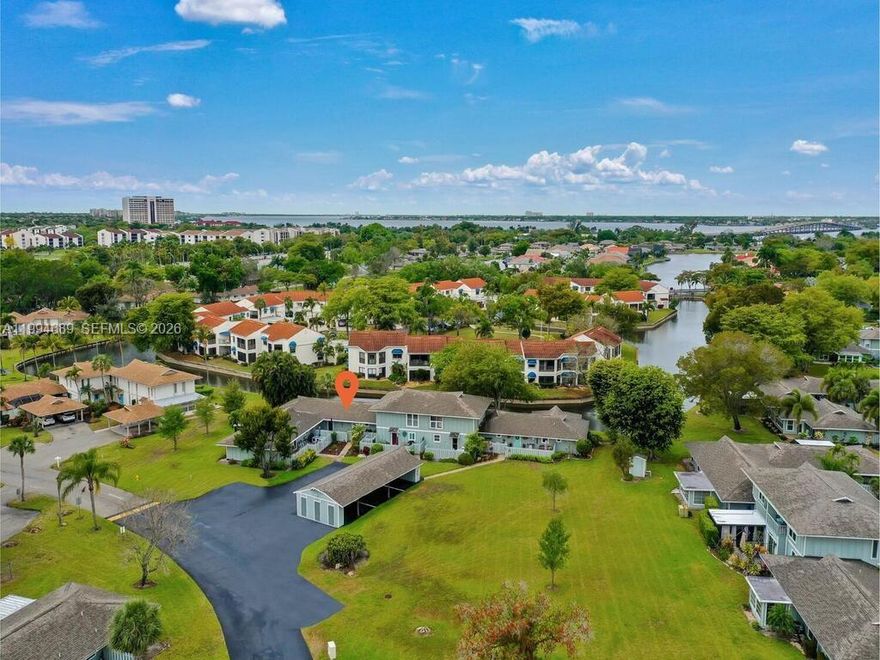 Welcome to Caloosa Bayview in the desirable McGregor Corridor! This move-in ready 3-bedroom, 3-bath home offers nearly 1,900 sq ft of updated living space with a bright open split floor plan and canal views from every window. The fully remodeled interior features crown molding, Plantation shutters, modern fixtures, and durable luxury vinyl plank flooring.

The updated kitchen includes quartz countertops, newer appliances (2025 fridge & dishwasher), custom cabinetry, glass tile backsplash, breakfast bar, and built-in wine storage. The spacious primary suite offers a walk-in marble shower and quartz vanity, while all bathrooms have been upgraded.

Enjoy year-round relaxation in the enclosed, air-conditioned lanai with peaceful water views and western sunsets, plus an additional outdoor patio. Additional highlights include walk-in closets, a large laundry room, newer carpet in guest rooms, and major updates such as a new roof (2020), HVAC (2024), water heater, and Culligan water softener system.

The home also features hurricane-impact windows, new landscaping (2025), a fenced paver patio, covered carport with storage, and guest parking. Caloosa Bayview offers resort-style amenities including a pool, spa, fitness center, and clubhouse. Ideally located near downtown Fort Myers, beaches, shopping, and dining, with no history of flooding or hurricane damage.