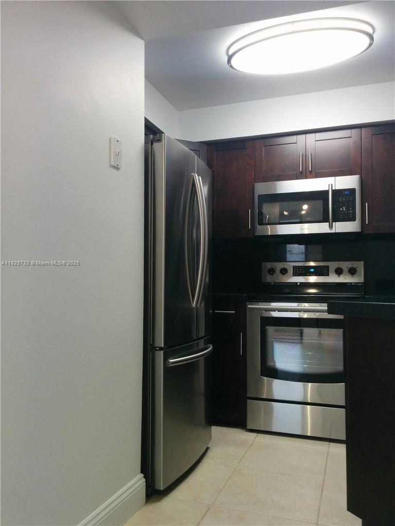 CONDO IN EXCELLENT CONDITION COMPLETELY RENOVATED A FEW YEARS AGO, 1 BEDROOM AND 1 BATHROOM,ONE PARKING SPACE ASSIGNED AND GUEST PARKING,MODERN BATHROOM,WOOD KITCHEN CABINETS WITH GRANITE COUNTER TOP AND SS. APPLIANCES,WASHER AND DRYER INSIDE THE UNIT,TILE FLOORS INCLUDING BALCONY,VERTICAL BLINDS,SCREEN BALCONY WITH LAKE VIEW,GATED COMMUNITY.ASSOCIATION APPROVAL REQUIRED.TENANT OCCUPIED PAYING $1,900 PER MONTH.LEASE EXPIRES 2/28/2026.PLEASE CALL 24 HOURS IN ADVANCE TO SCHEDULE A SHOWING. CALL LISTING AGENT FOR SHOWINGS.CASH ONLY.