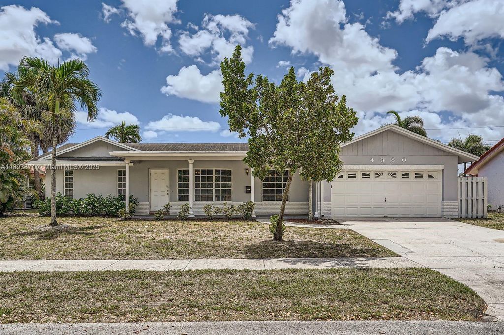 Photo of 4380 NW 4th Ct, Coconut Creek, FL 33066 (MLS # A11893877)