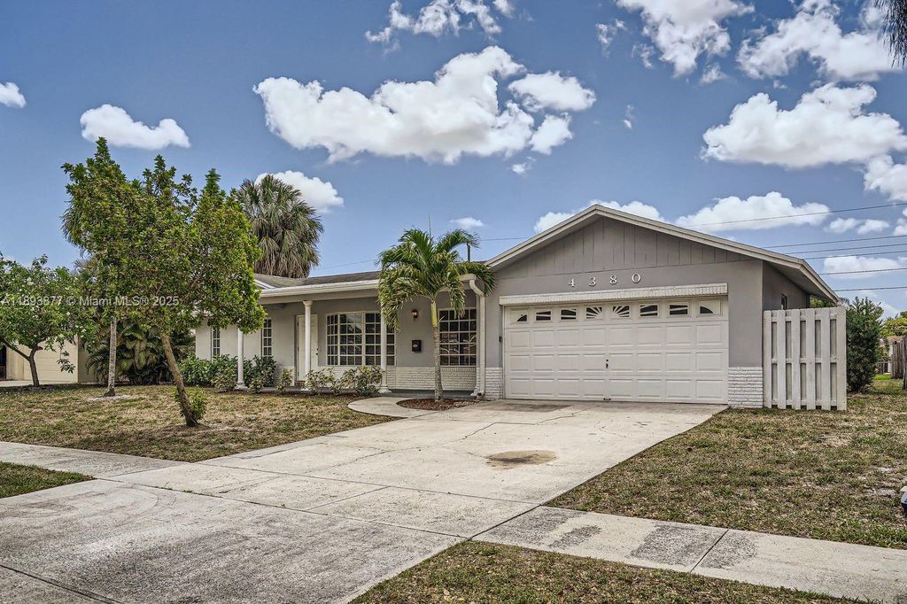 Photo of 4380 NW 4th Ct, Coconut Creek, FL 33066 (MLS # A11893877)