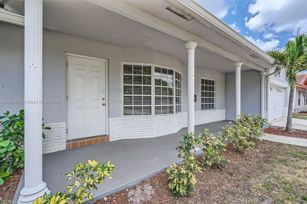 Photo of 4380 NW 4th Ct, Coconut Creek, FL 33066 (MLS # A11893877)