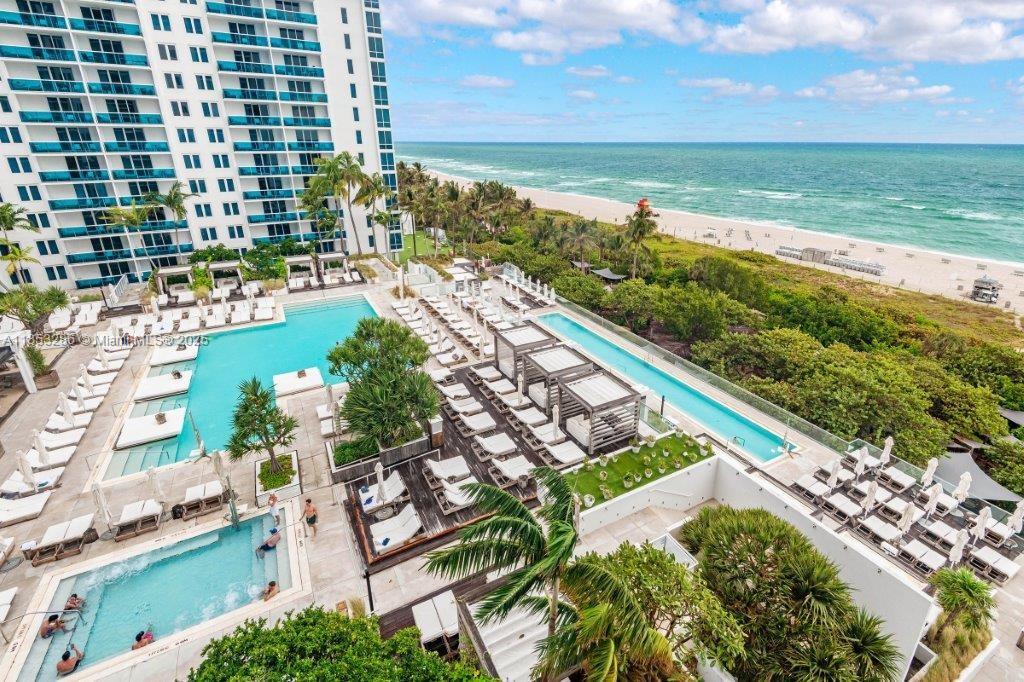 Beautifully remodeled oceanfront studio with balcony boasting commanding views of the ocean and 1 Hotel pool area. Rarely available, highly sought after line; All in "like new" condition with Washer & Dryer in a warm, clean and modern design. Cable, WiFi, water and 1 valet parking spot included in maintenance. Roney Palace Amenities Situated inside the same building as the luxurious 1 Hotel, Roney Palace residents enjoy the best of South Beach with access to 3 oceanfront swimming pools, a hot tub and beach service. Onsite restaurants include Aviv, STK South Beach, Plnthouse organic café, Watr at the Rooftop and more! Home to SoulCycle, Anatomy Gym, high-end spa, salon and retail fashion boutiques. Valet parking, full-time security, onsite management office.
