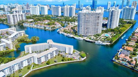 Photo of 3030 Marcos Dr #T301, Aventura, FL 33160 (MLS # A11958248)