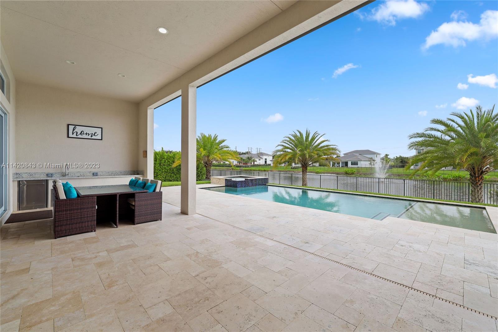 A lifetime achievement of inspiration, ONE-OF-A-KIND LAKEFRONT ESTATE IN GATED COMMUNITY DRIVEWAY ACCOMMODATES 6 CARS IMPACT-FRONT DOOR SPACIOUS GOURMET KITCHEN GRANITE COUNTERS ISLAND WALKIN DESIGNER CLOSETS, OVERSIZED FULLY FENCED. This luxurious 1 story home boasts a bright expansive floor and is a gem that speaks for itself! ELEGANT FINISHES & DETAIL, Designed with a Unique BBQ area chef-inspired. Gorgeous lake views, a lovely Heated saltwater pool spa an outdoor kitchen and lots of lush landscaping A-rated location/schools. Located within minutes of Downtown Davie, Nova University, Hard Rock, and all the expressways. Take advantage of this opportunity to own your DREAM HOME, SELLER MOTIVATED SEND YOUR OFFER BY SEPTEMBER 15TH AND GET $10,000 BONUS IF CLOSE. SELLER WILLING TO NEGOTIATE