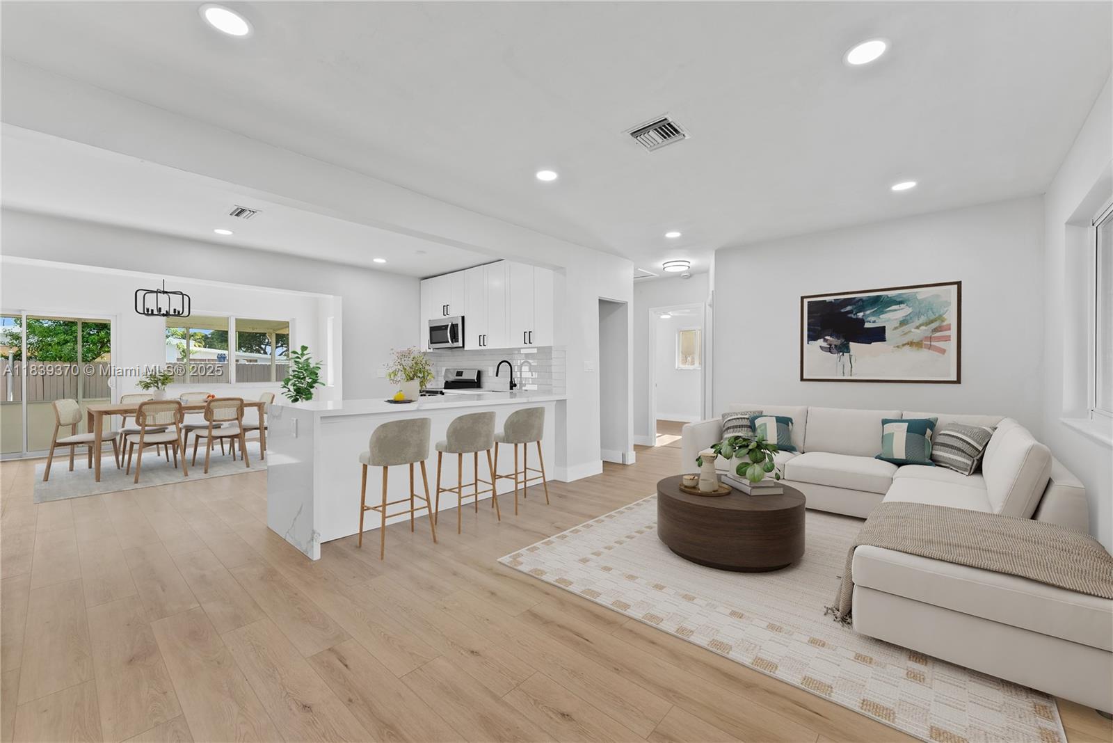 Just listed in the heart of Pembroke Pines! 1400Sqft after Addition, This fully renovated 3-bed, 2-bath gem at 7021 SW 12th St offers peace of mind with brand-new impact windows, roof, electrical, plumbing, kitchen, and bathrooms — all fully permitted and professionally done. No corners cut, no projects left behind. Just move in and enjoy! Conveniently located near schools, parks, shopping, and major highways. This is basically a new home—without the new construction price tag. Don’t miss it! NO HOA!