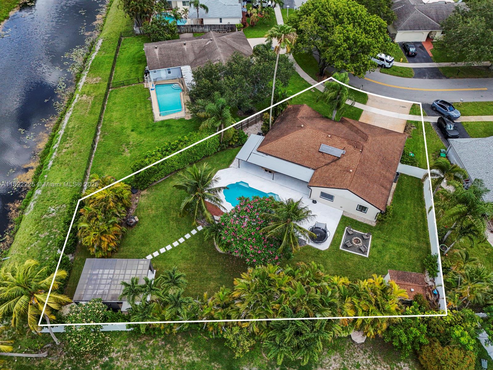 Fully renovated 4 bed, 2 bath oasis home located in the highly desired Flamingo Gardens neighborhood of Cooper City. Situated on a waterfront lot of over 20,000 SF. This stunning home offers modern upgrades throughout and an expansive backyard oasis. The home features a brand-new kitchen with new stainless steel appliances, custom cabinetry, and an open layout. The split-bedroom floor plan includes a spacious primary suite, large walk-in closet with built-ins, and access to the patio. Enjoy completely redone spa pool (2024), expansive green space, and a large backyard gazebo. Walking distance to Griffin Elementary and located in one of Cooper City’s top-rated school districts. No HOA. This is a rare opportunity to lease a fully renovated home on one of the largest lots in the area.