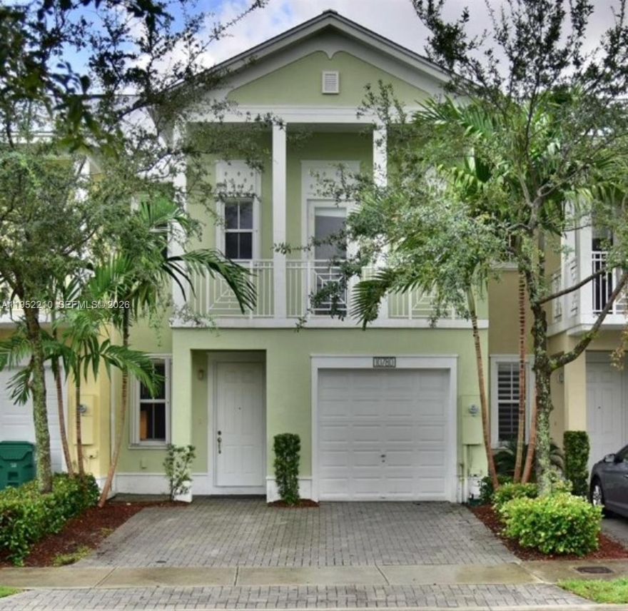 Priced to sell. Spacious 3-bedroom, 3-bath, two-story townhouse located in a secure gated community with 24-hour surveillance. The home features high ceilings at the entrance, large kitchen with plenty of cabinets and storage, and separate laundry room. Both upstairs bedrooms offer extra-large closets and private balconies. Oversized primary suite and spacious bathroom with separate tub and shower.

The upstairs flex space provides the perfect area for a playroom, home office, or additional living space, complete with a safety net enclosure ideal for kids and pets. The property also includes a 1-car garage and recent upgrades such as a brand-new A/C system and dishwasher (2025).

Community amenities include a clubhouse with pool, gym, and playground. Ideally located directly across from the playground in a very family-friendly community.

The association is in the process of implementing multiple upgrades designed to enhance the community and add long-term value to the condominium and townhomes.

Text listing agent for video.