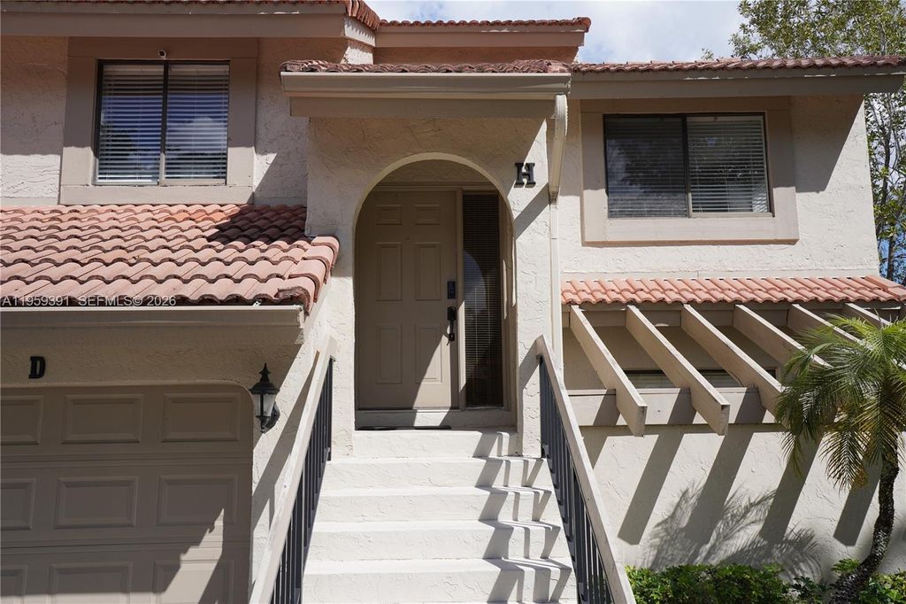 Photo of 5741 Coach House Cir #H, Boca Raton, FL 33486 (MLS # A11959391)