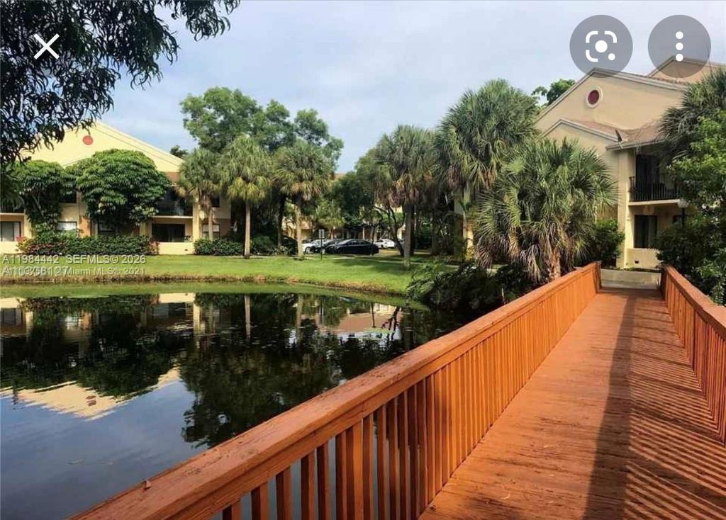Photo of 9999 Summerbreeze Dr #218, Sunrise, FL 33322 (MLS # A11984442)