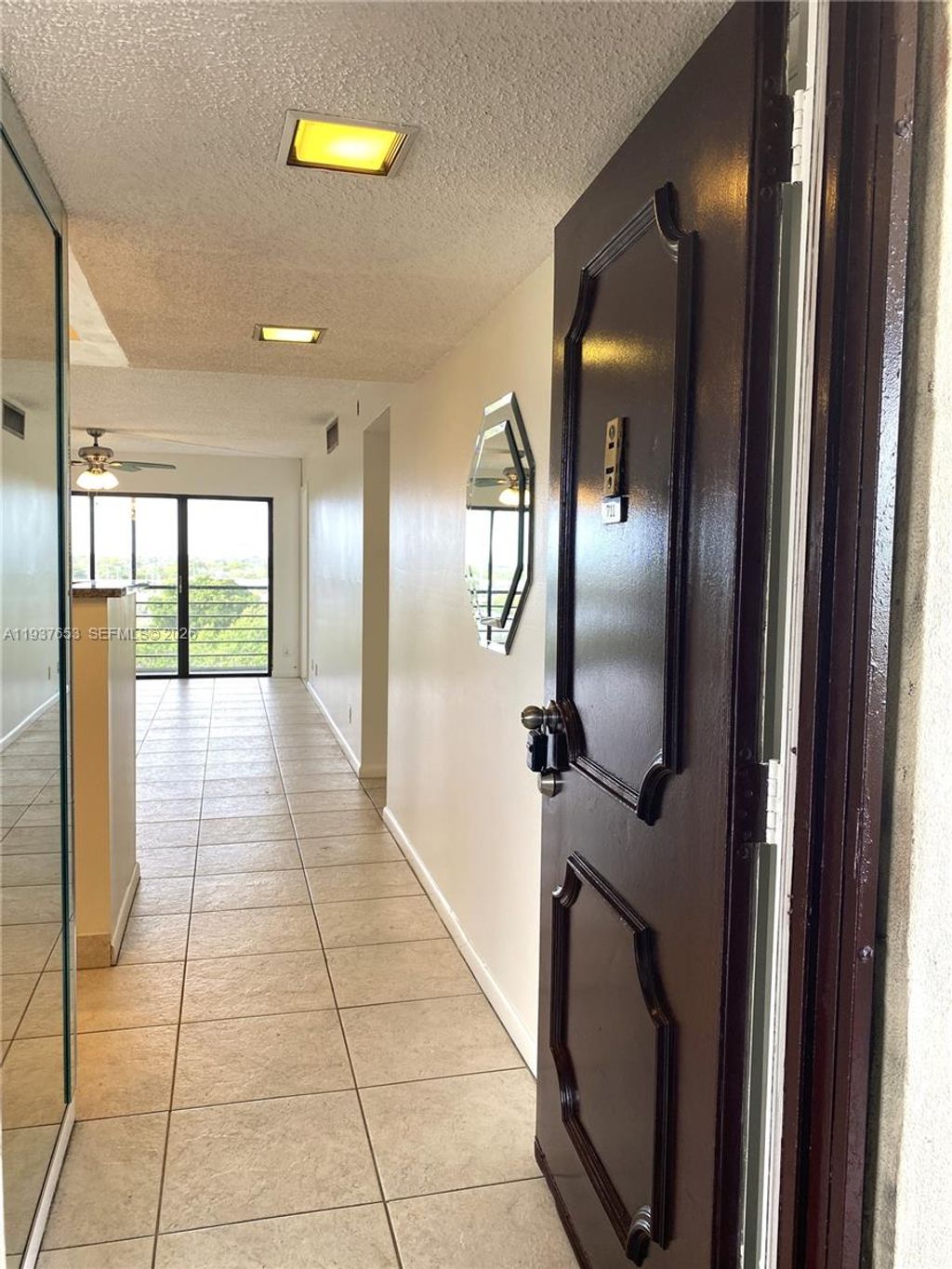 Photo of 2322 S Cypress Bend Dr #711, Pompano Beach, FL 33069 (MLS # A11937653)