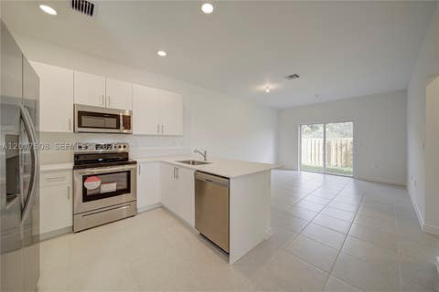 Tiny photo for 11881 NW 47th Mnr, Coral Springs, FL 33076 (MLS # A12077508)