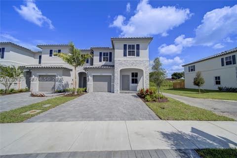 Photo of 11881 NW 47th Mnr, Coral Springs, FL 33076 (MLS # A12077508)