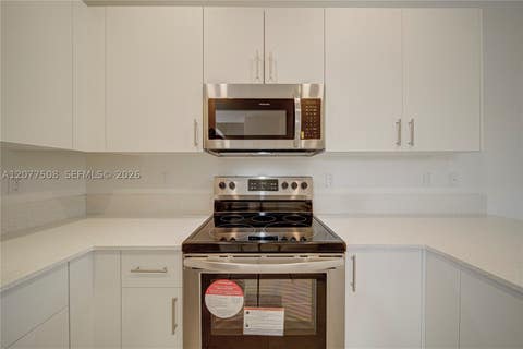 Tiny photo for 11881 NW 47th Mnr, Coral Springs, FL 33076 (MLS # A12077508)