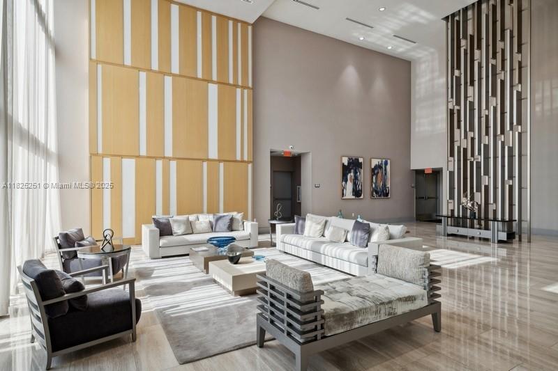 Welcome to Unit 1107 in Downtown Doral! This stunning 1BD/1BA home offers 698 sq. ft. of modern living with custom walk-in closets, blackout shades, and assigned covered parking. Enjoy breathtaking east-facing views of the Miami skyline and international airport. Like in San MartÃn, relax by the pool while watching airplanes fly close overhead. Located in a vibrant, walkable neighborhood steps from top-rated schools, beautiful parks, fine dining, boutiques, and cafes. Residents enjoy luxury amenities including a fully equipped gym, spa with sauna, kids’ play area, conference and party rooms. Experience the perfect mix of comfort, convenience, and city energy—Downtown Doral, where city life is reimagined.