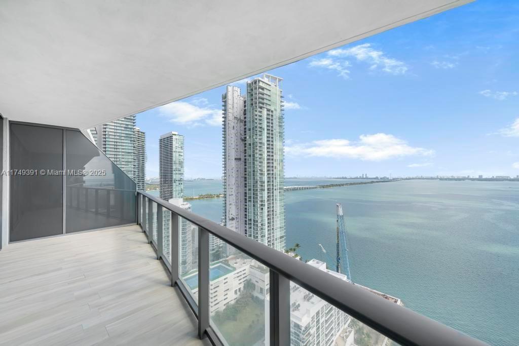 ESCAPE TO YOUR PRIVATE OASIS IN THE SKY WITH THIS EXQUISITE 2-BEDROOM, 2-BATHROOM WITH 3 PARKING SPACES RESIDENCE IN ICON BAY. ENJOY PANORAMIC VIEWS OF BISCAYNE BAY, FLOOR-TO-CEILING WINDOWS AND A PRIVATE ELEVATOR FOYER IN LINE 03 THE BEST LINE IN THE RESIDENT. THE GOURMET KITCHEN AND SPA-LIKE BATHROOMS ARE DESIGNED FOR THE MOST DISCERNING TASTES. WITH WALK-IN CLOSETS AND EXPANSIVE BALCONIES, THIS CONDO OFFERS THE PERFECT BLEND OF LUXURY AND COMFORT. THIS RESIDENCE ALSO INCLUDES 3 PARKING SPACES FOR YOUR VEHICLES. INDULGE IN THE RESORT-STYLE AMENITIES, A GYM AND TENNIS COURTS. LOCATED IN THE HEART OF MIAMI, YOU'LL BE JUST MINUTES AWAY FROM WORLD-CLASS SHOPPING, DINING, AND ENTERTAINMENT IN WYNWOOD AND THE DESIGN DISTRICT. EXPERIENCE THE ULTIMATE IN URBAN LIVING IN THIS STUNNING RESIDENCE!