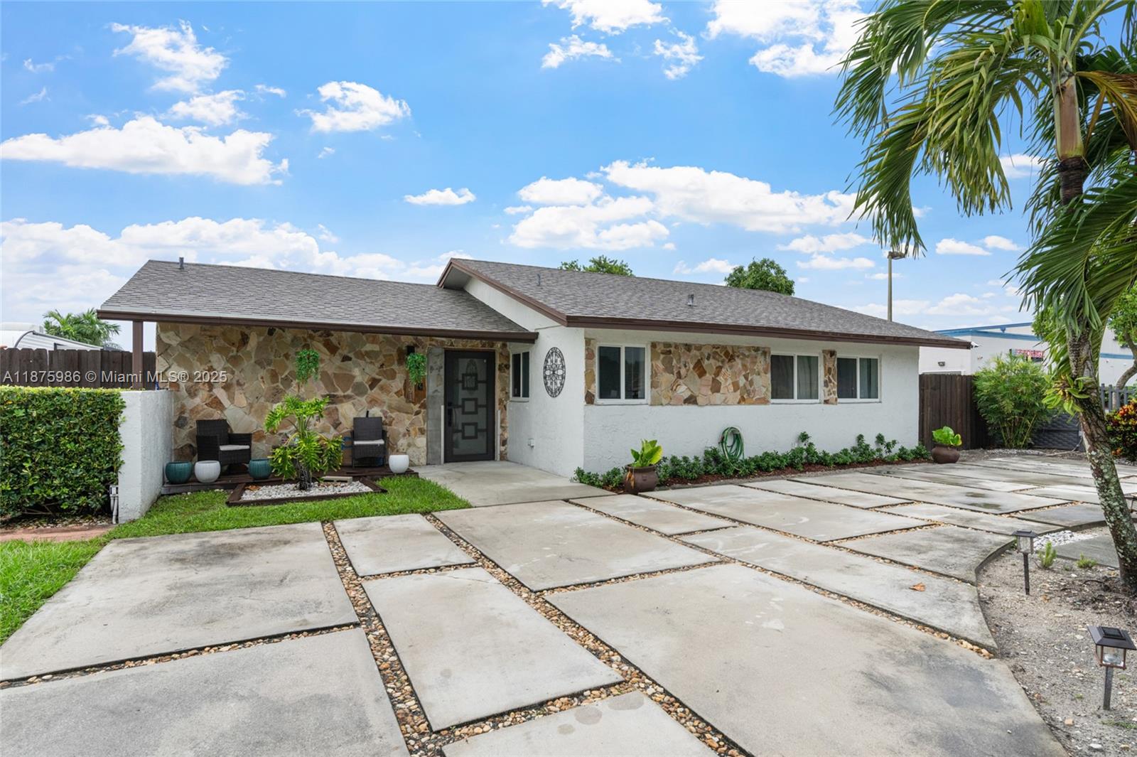 Charming 3-bedroom, 2-bathroom single-family home in Miami Gardens featuring impact windows, a new roof, and new AC. Inside, enjoy bright living spaces, a functional kitchen, and spacious bedrooms with ample closets, including a walk-in. Updated bathrooms add a modern touch. Step outside to a large backyard with an outdoor kitchen and dining area, covered patio, and plenty of space for RV parking or future upgrades.Conveniently located just minutes from Hard Rock Stadium, major highways, shopping, dining, and schools, this home combines comfort, modern updates, and ideal accessibility.