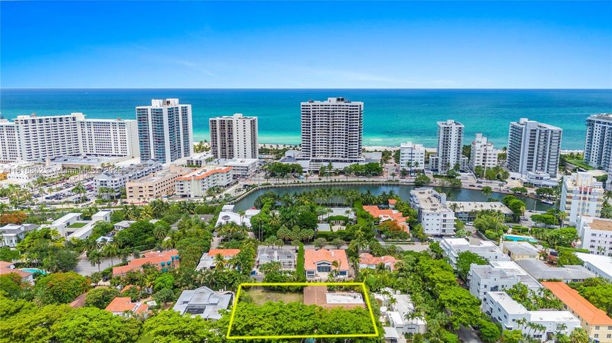 Build your dream home on a rare double lot in the heart of Miami Beach, located off Pine Tree Dr in a private enclave on Flaming Place. One side of the property features a 5,040 sqft mid-century modern one-story home with a garage, a spacious front yard, a circular driveway, plus a large backyard with plenty of room for a pool and entertaining. The expansive 20,800 sqft lot can be sold as one property or split. This quiet, tree-lined street is near a pedestrian bridge w/ beach access, and close to dining, shops, markets, Sunset Harbor, Lincoln Road, the 1 Hotel, schools, a new public park, the Hebrew Academy, and a Youth Center with an olympic pool and ice rink. Don’t miss this rare opportunity to own a piece of Miami Beach’s prime real estate on one of the city’s highest elevated streets