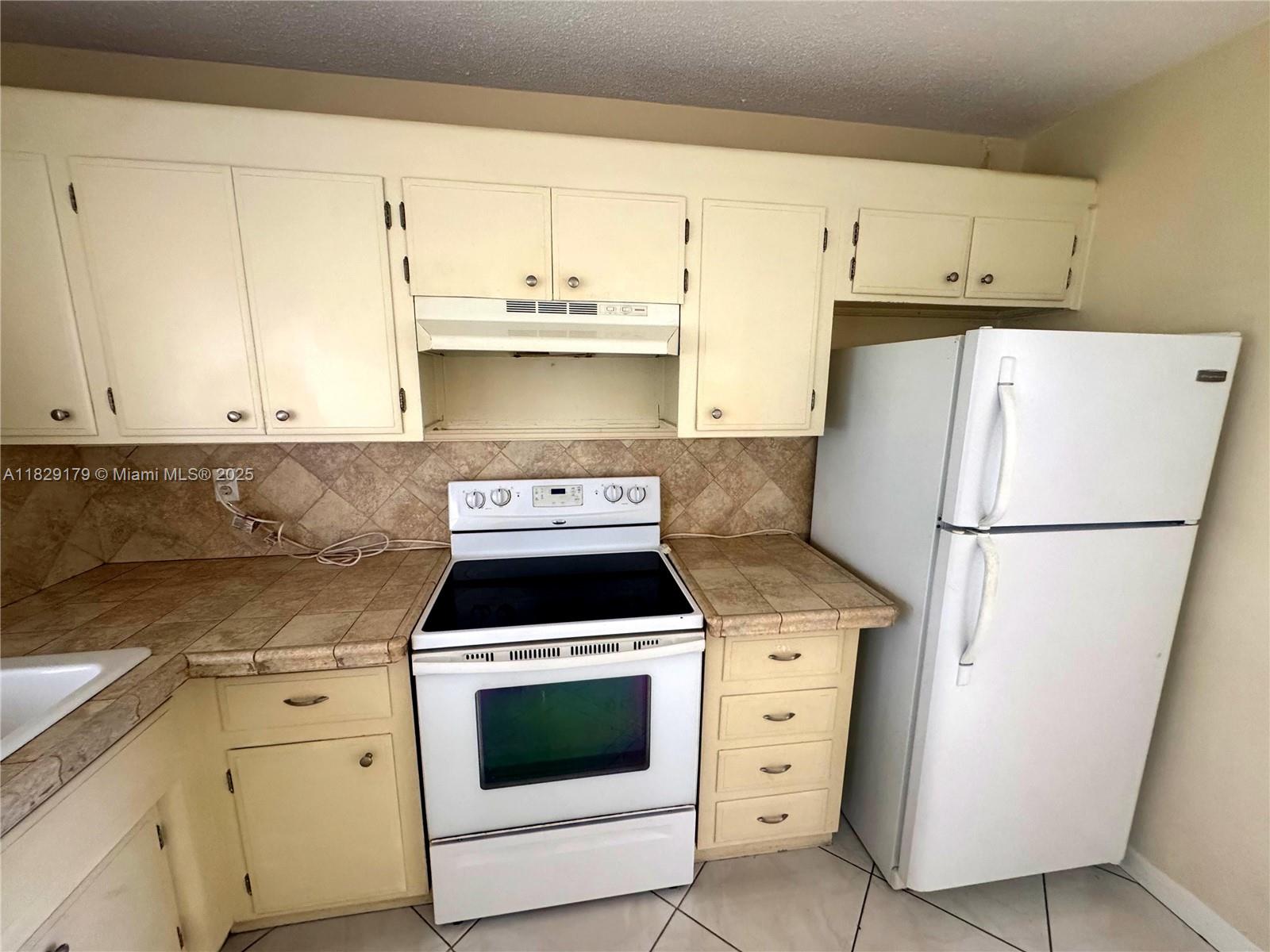 2309 NW 54th St, Tamarac, FL, 33309/$349,999 4 2309 NW 54th St