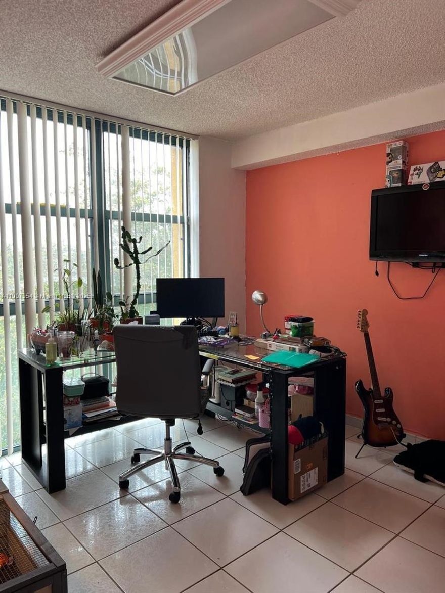 Spacious and well-maintained 3-bedroom, 2-bathroom condo located in the heart of West Miami. This 1,114 sq ft unit offers a comfortable layout with tile flooring throughout, a bright living and dining area, and a functional kitchen ready for your personal touch. The split-bedroom design provides privacy, ideal for families or roommates. Enjoy the convenience of living in a secure building with well-kept common areas and nearby amenities including shops, dining, schools, and public transportation.This property is a great opportunity for homeowners or investors alike.