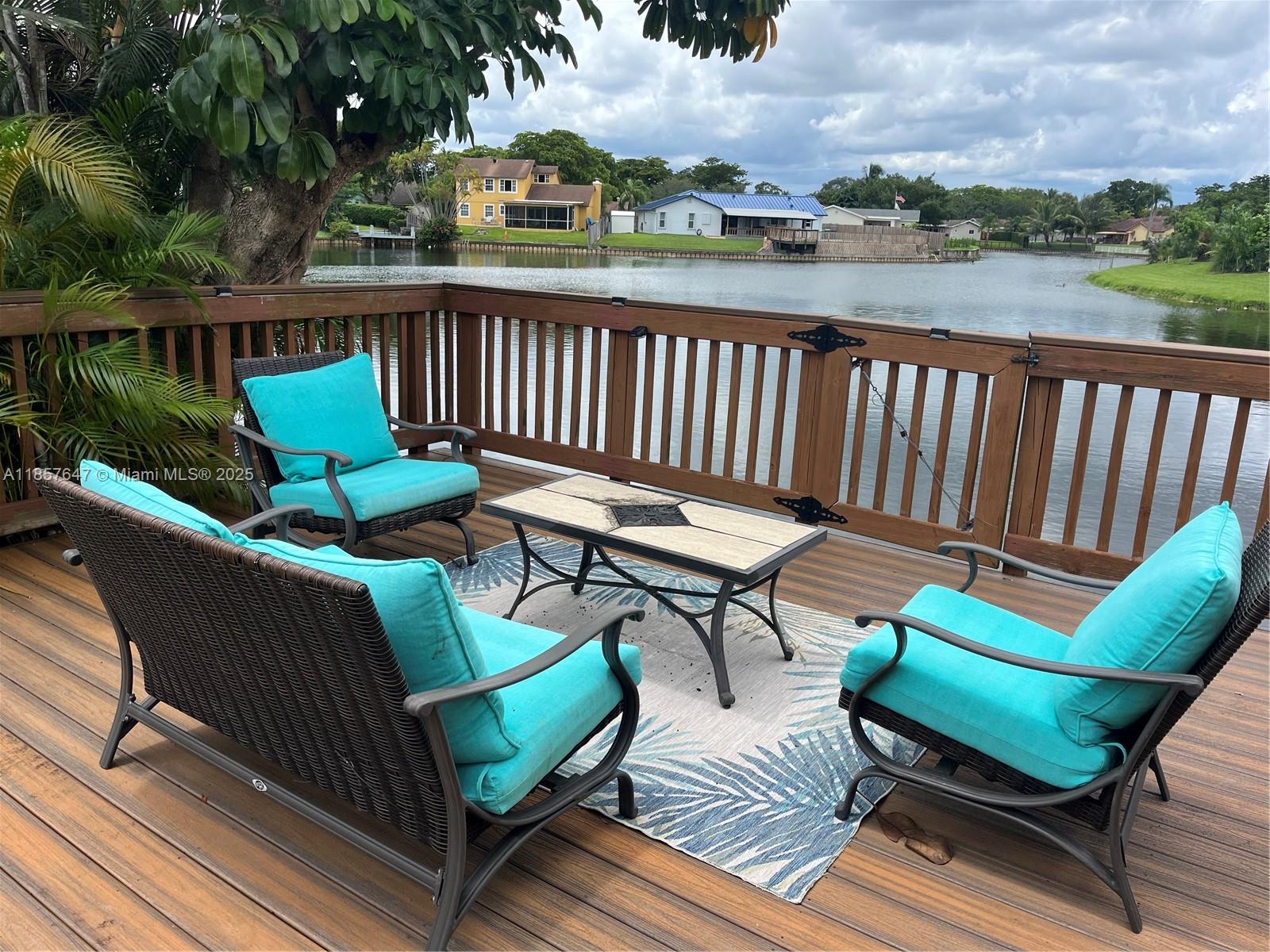 Lakefront 3 bedroom, 2 bath residence in highly sought after Cooper City neighborhood. Enjoy serene lake views while relaxing in the pool. This home features impact windows and doors, new metal roof and newly remodeled kitchen completed in 2025. This home is a true gem situated in one of Cooper City's most coveted neighborhoods with A rated elementary, middle and high schools. No HOA fees just a low annual lake maintenance fee of $95.